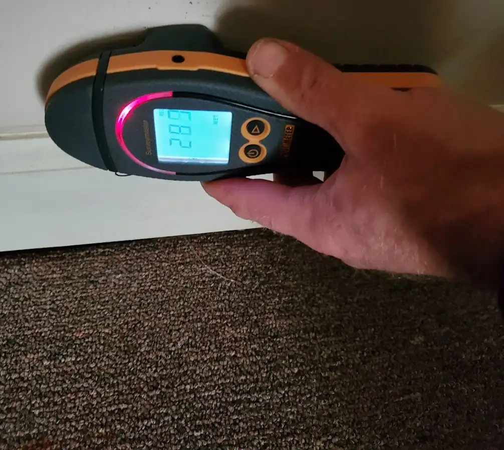 Moisture detection at baseboard during Storm Damage Restoration in Bellmead